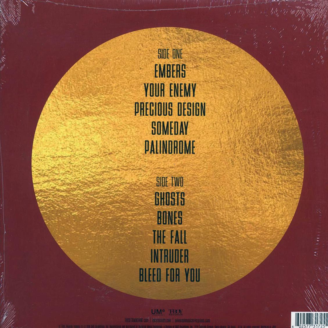 The Beta Machine - Intruder (180g) (red/black swirl vinyl) vinyl LP back cover