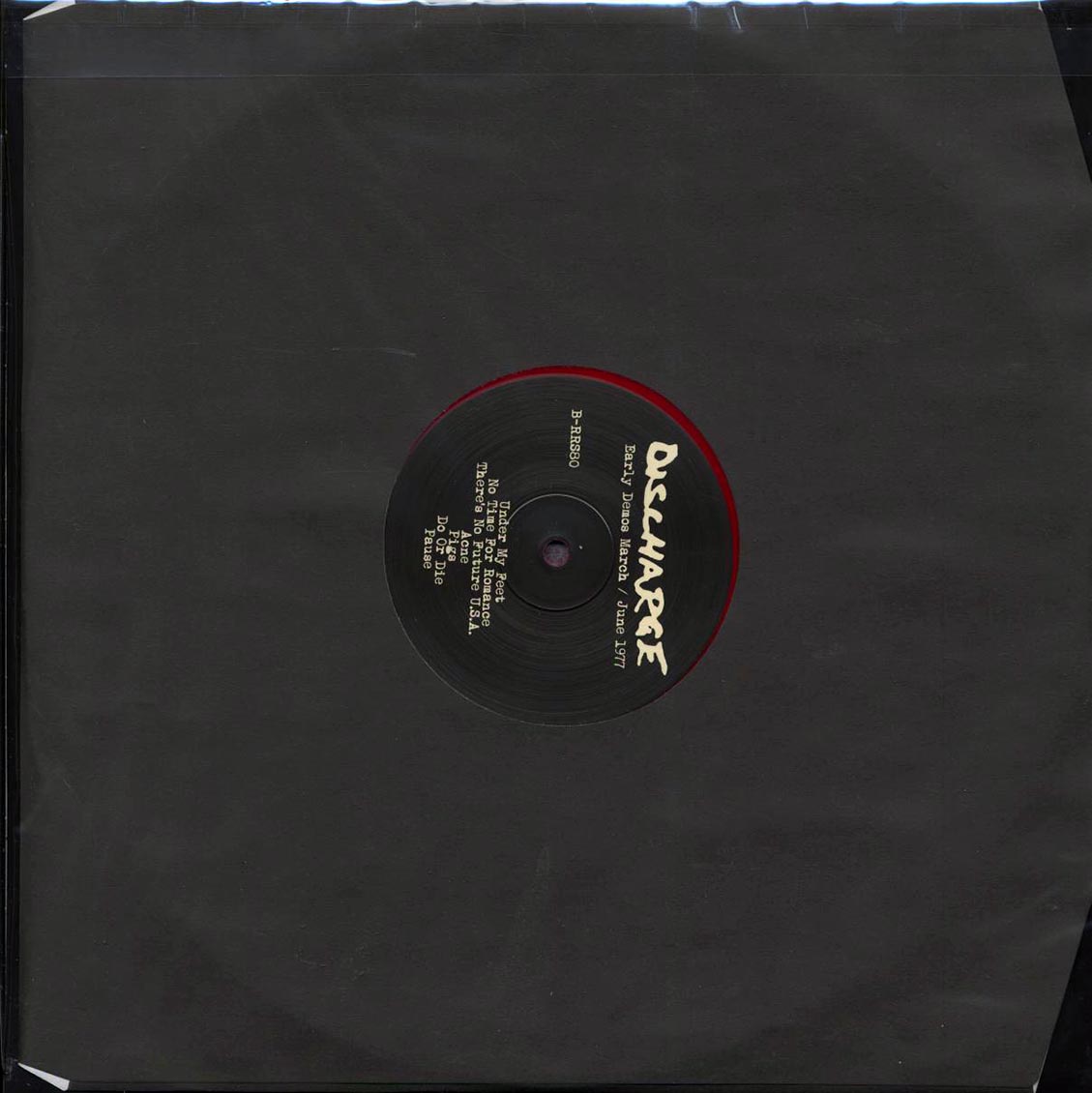 Discharge - Early Demos: March, June 1977 (red vinyl) vinyl LP back cover